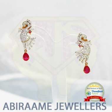 bridal diamond jewellery, diamond jhumkas, diamond earrings, diamond stud earrings, diamond earrings for women